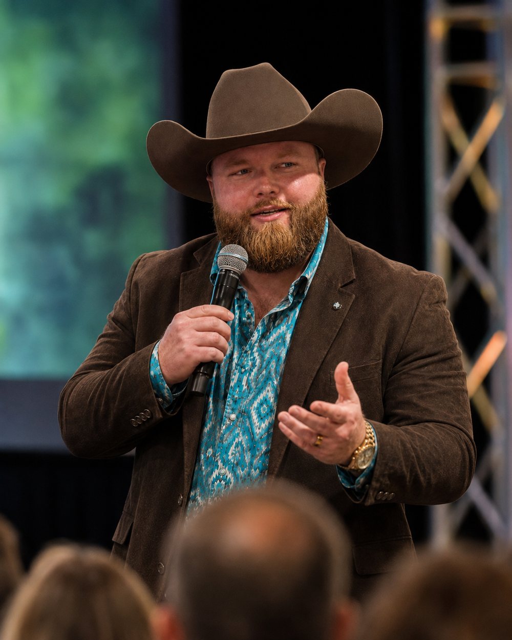 The 3PL Cowboy speaking on stage at an industry event