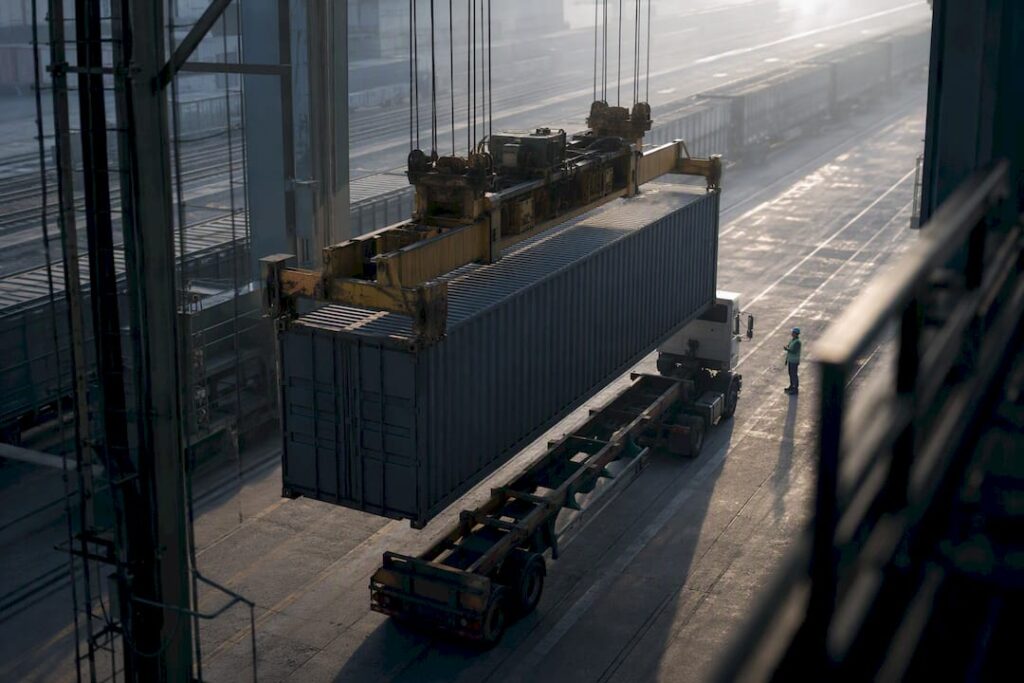 Container transfer at an intermodal rail terminal